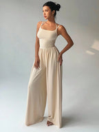 Women's Casual Solid Color Pleating Loose Straight Jumpsuit A-line Backless Halter Neck Slim Cami Jumpsuit Streetwear 2025 - Matrix Studios