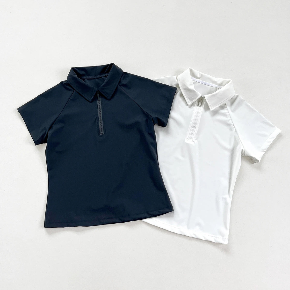 Women's Short - Sleeve Polo Shirts: White and Navy Blue Options Available, Half - Zip Collar for Both Style and Comfort 。 - Matrix-studios.com
